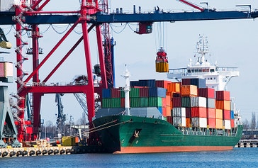 image title: Crane loading a container ship